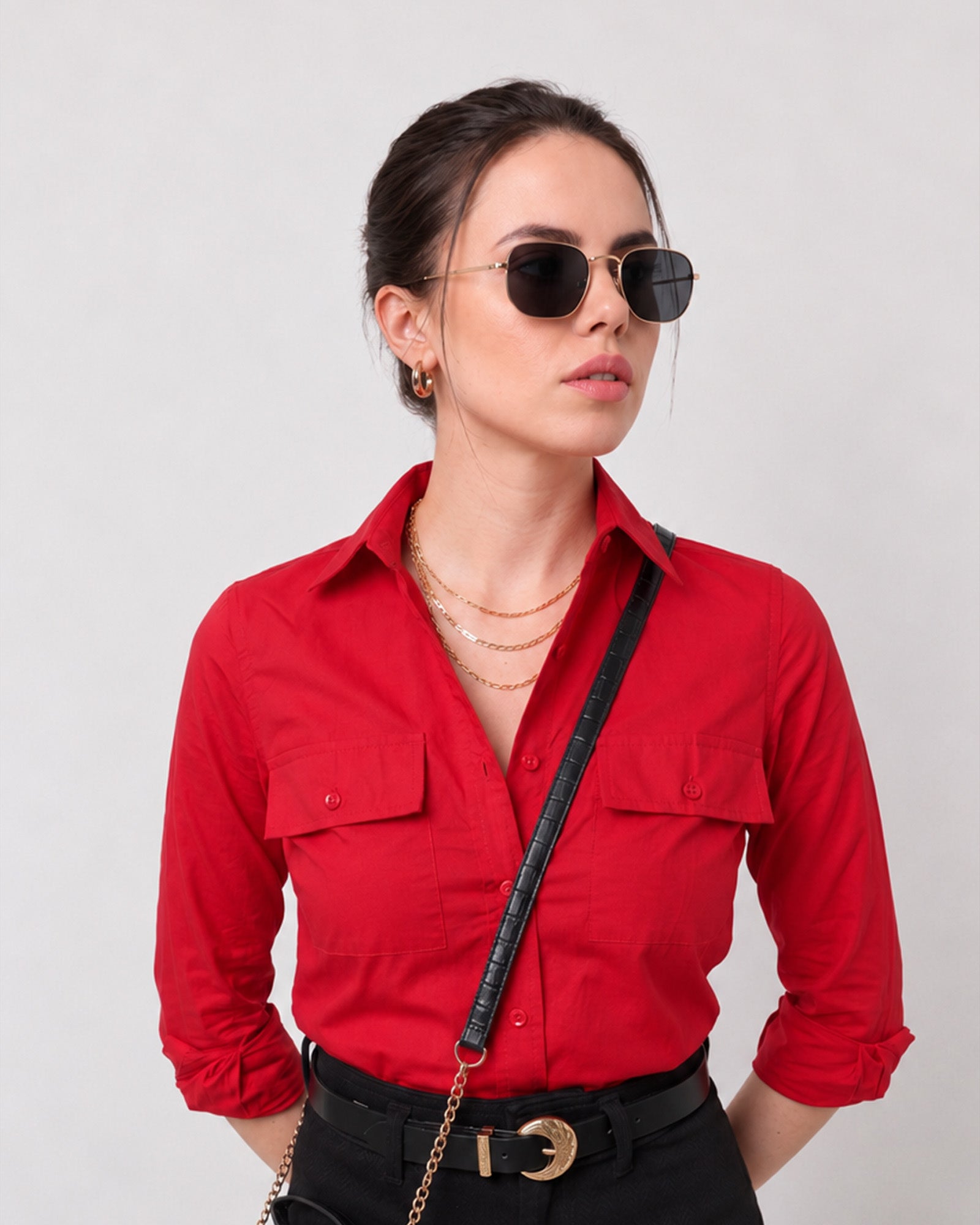 Gracy scarlet red utility shirt with a full button-down placket and buttoned cuffs, close-up view