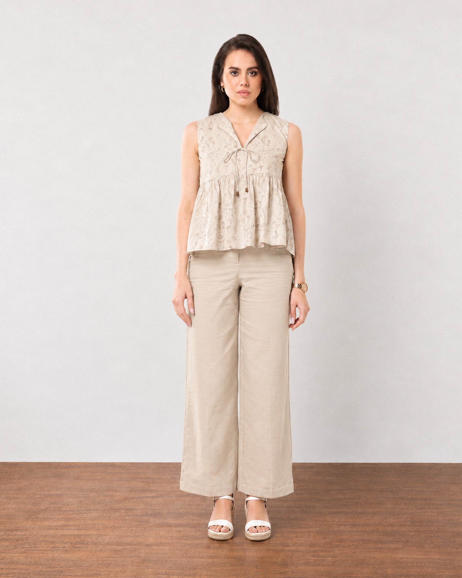 Gazillion Gretchen stylish beige printed peplum top for women, full-length front view