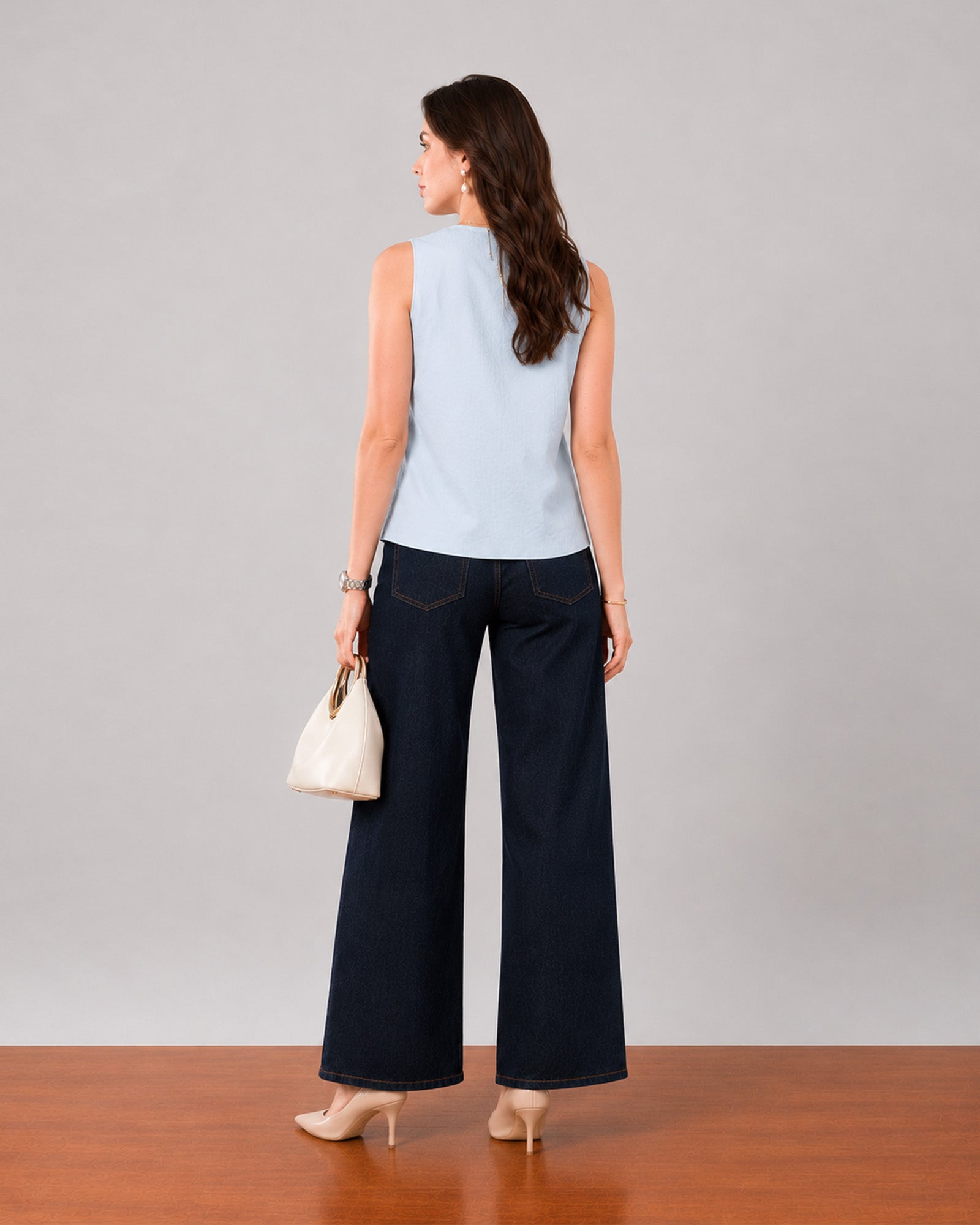 Gusta sky blue sleeveless cotton top with a clean back, back view