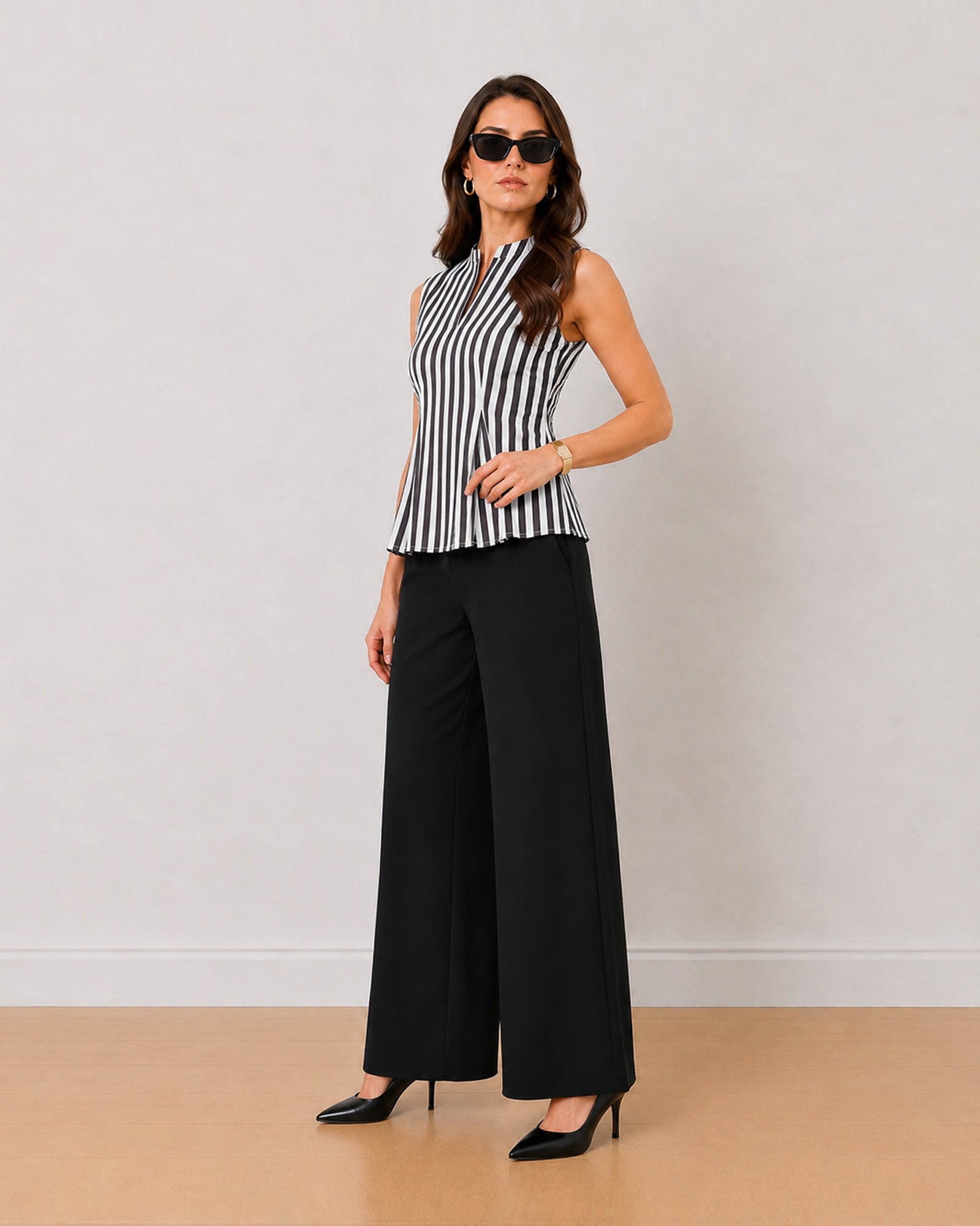 Hellen black and white striped sleeveless cotton office top, angled view