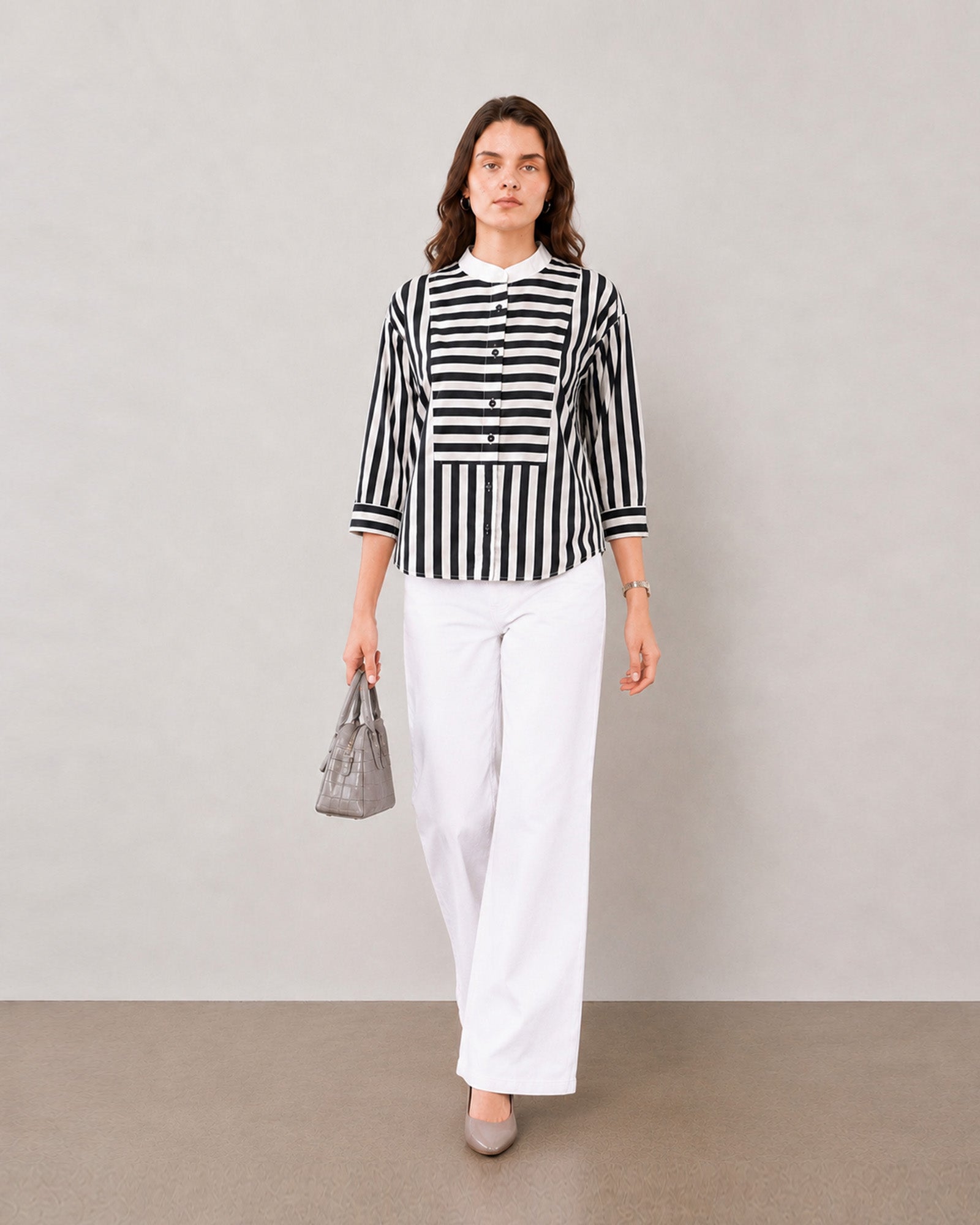 Helvia black and white striped cotton shirt styled with white wide-leg trousers