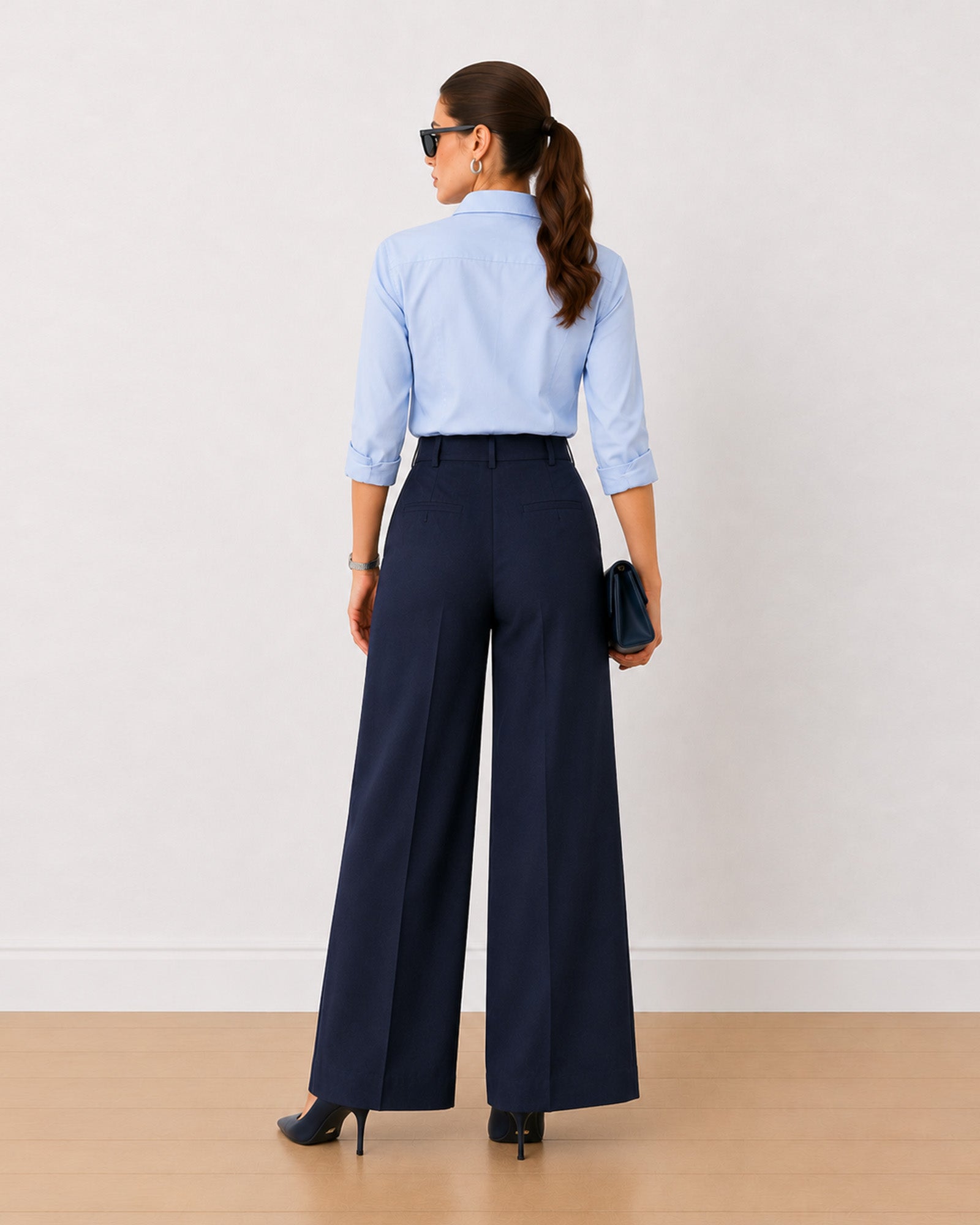 Henrietta navy blue herringbone texture pants, back view showing clean seat seams