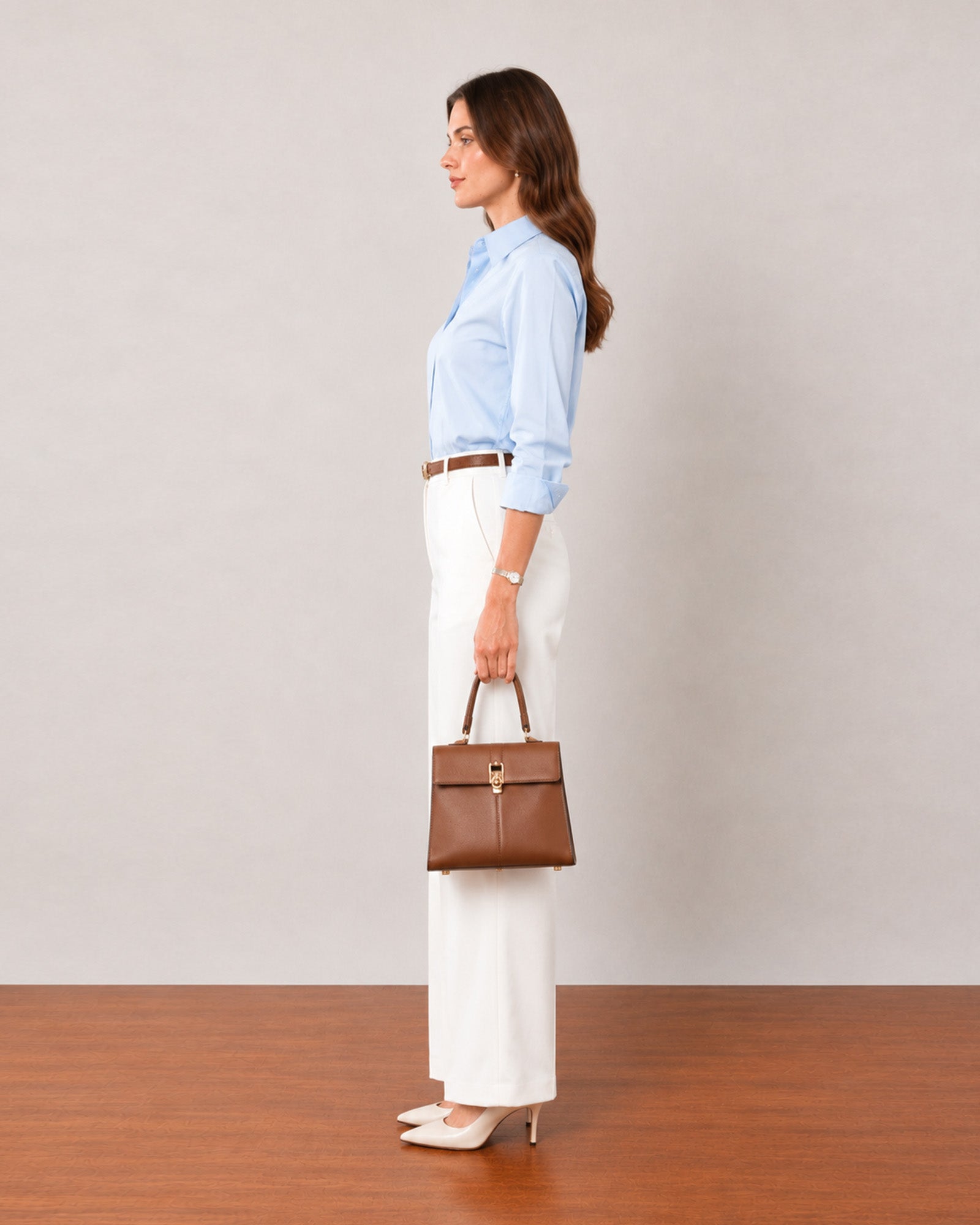 That sky blue formal shirt with tailored cuffs and side seam darts, side profile view