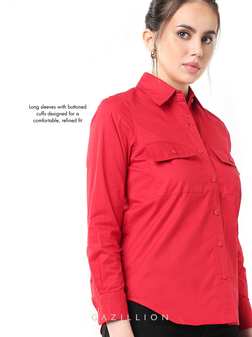 Close view of a long sleeve gathered into its buttoned cuff