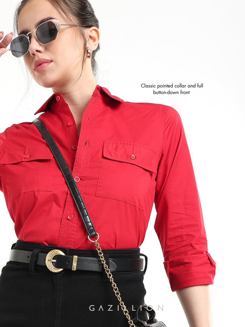 Close view of the pointed collar and the buttoned front placket