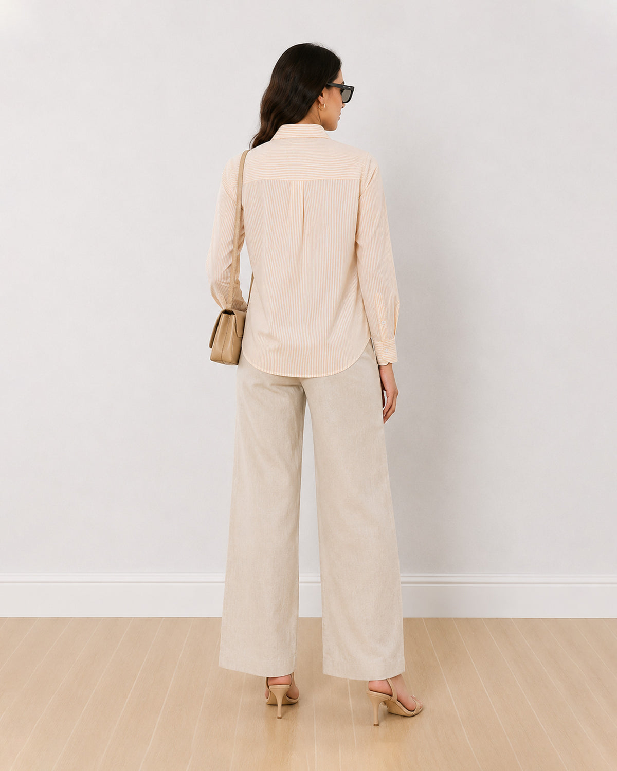 Aksa yellow and white striped cotton shirt back view with the centre back pleat