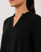 Alda black viscose top stand collar and V-neck close-up, elegant office styling