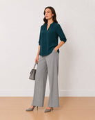 Alda bottle green 100% viscose loose top, angled front view with the boxy fit