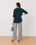 Alda bottle green 100% viscose plus size top back view with the boxy fit