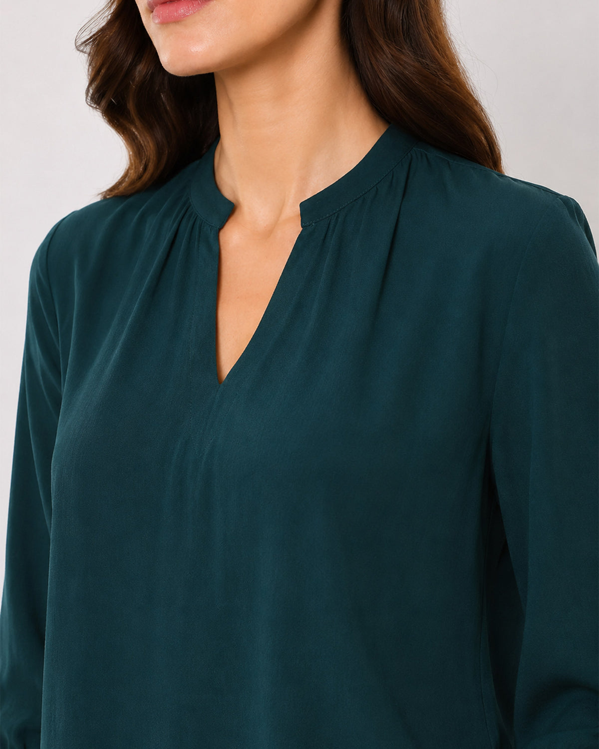 Alda bottle green viscose top stand collar with V-neck close-up, smart and classy