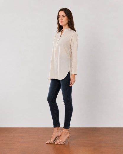 Alexa beige cotton linen tunic shirt, angled front view with the long tunic length