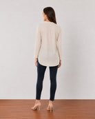 Alexa beige cotton linen tunic shirt back view with the long length and curved hem