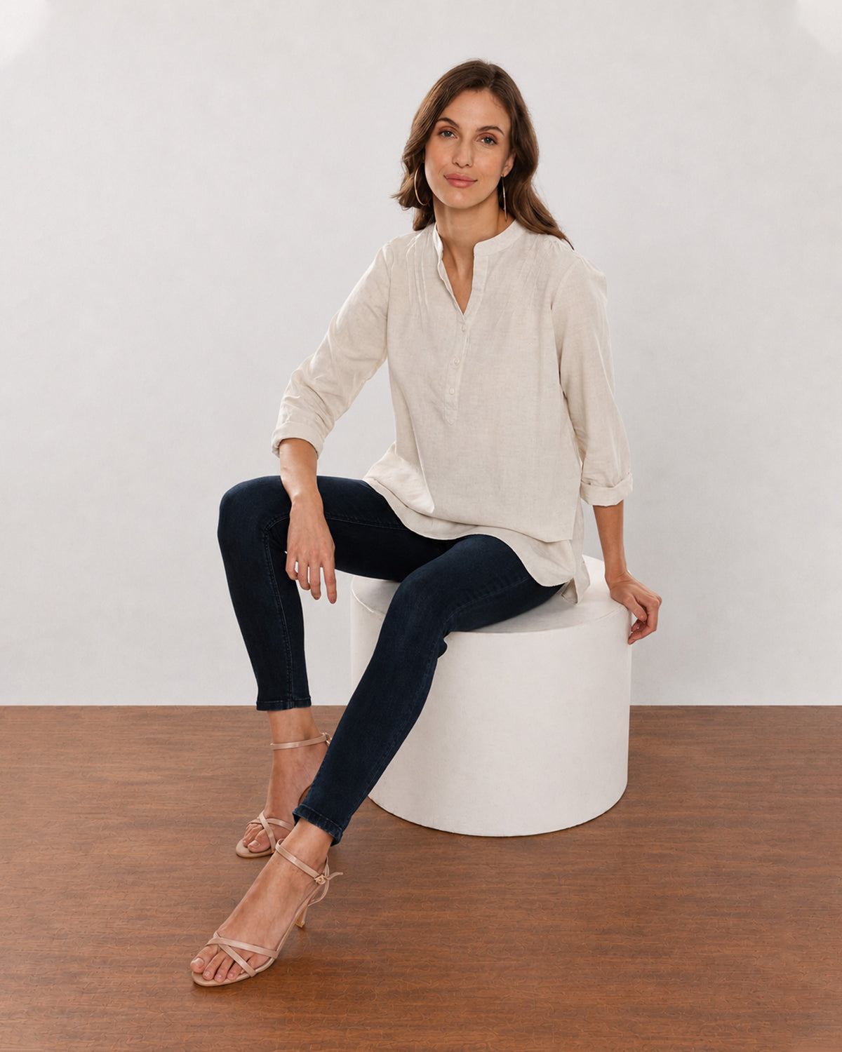 Alexa beige cotton linen plus size tunic shirt seated, front view with full sleeves