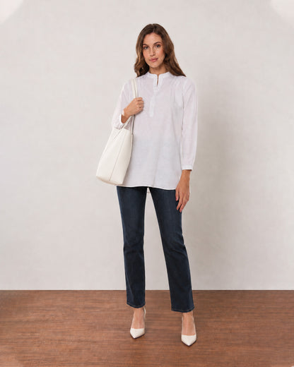 Alexa white cotton linen tunic shirt, angled front view with the long tunic length