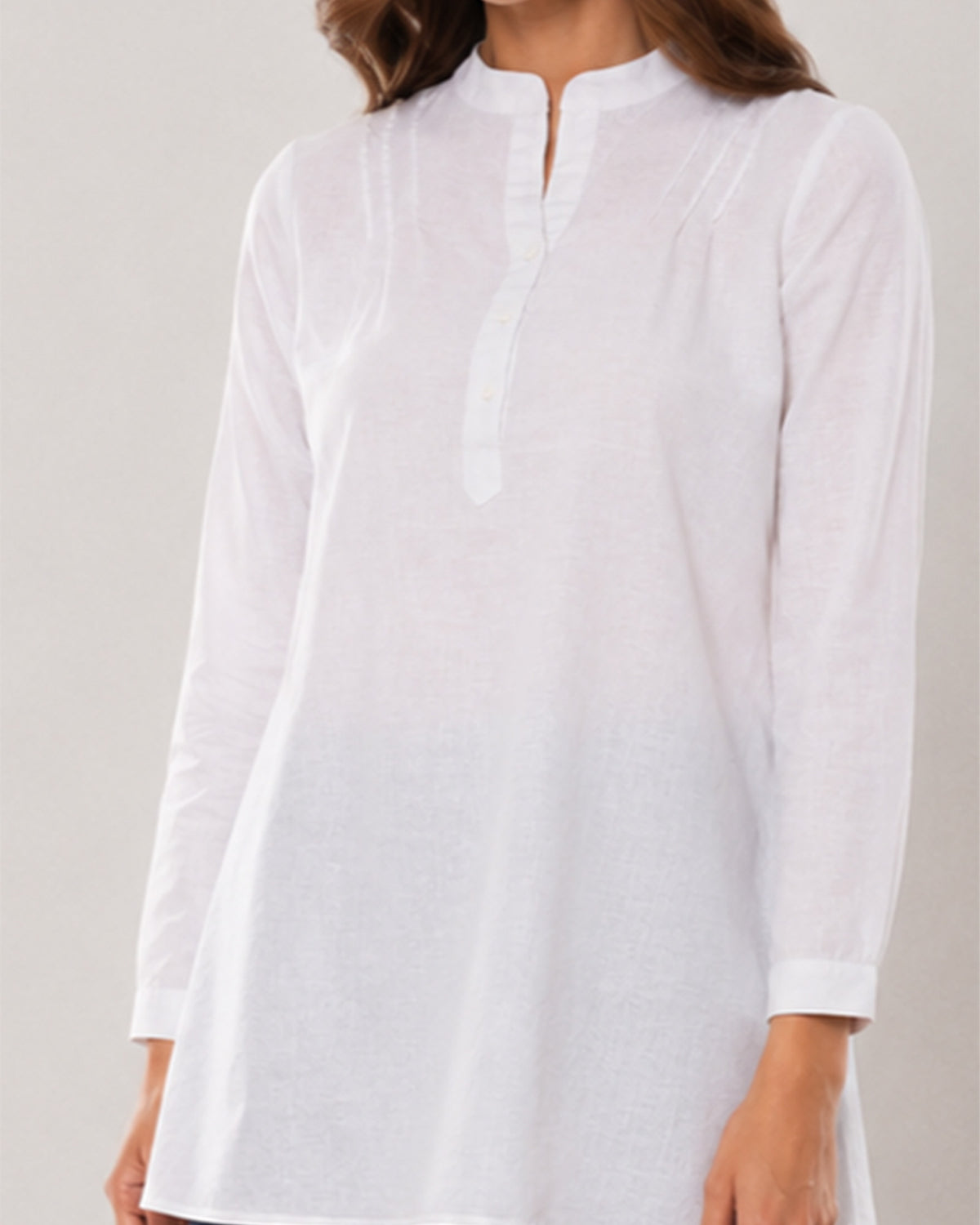 Alexa white cotton linen tunic shirt half placket with the dignity buttons and curved hem close-up