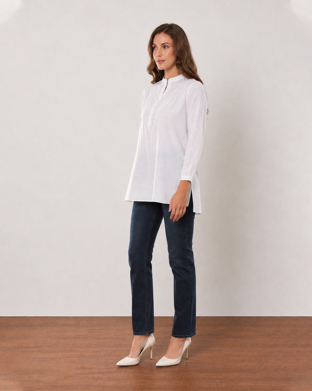 Alexa white cotton linen tunic shirt side view with the side slit and curved hem