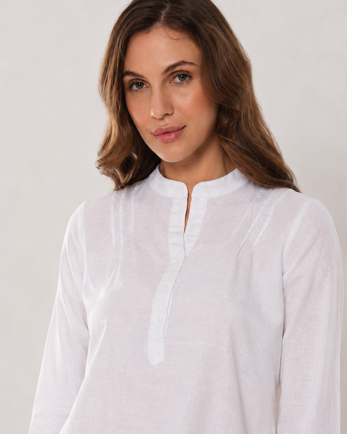 Alexa white tunic shirt stand collar with V-neck and the triple shoulder darts