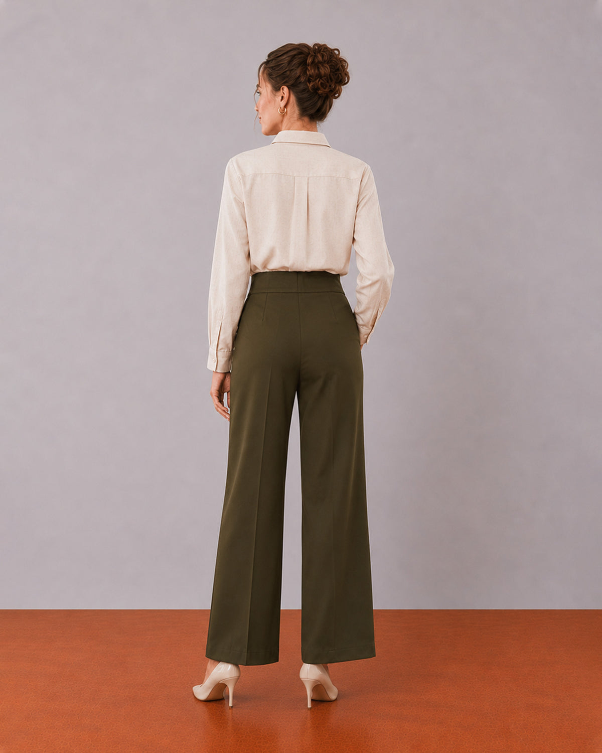 Alexis beige cotton linen shirt back view with the drop shoulder and curved hem