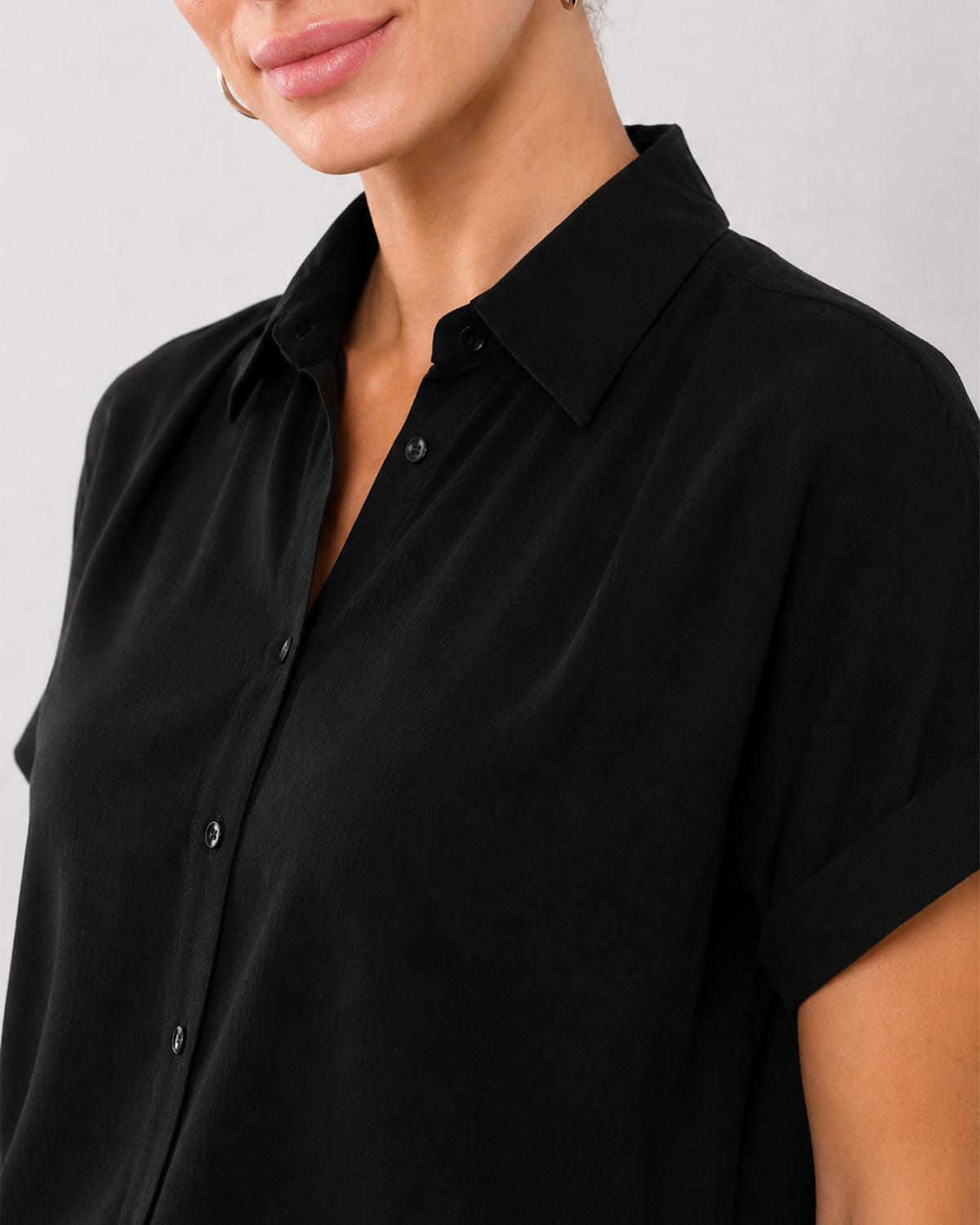 Alfa black viscose shirt collar and placket close-up with the hidden dignity buttons