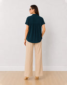 Alfa bottle green 100% viscose shirt back view with the gathers at the yoke