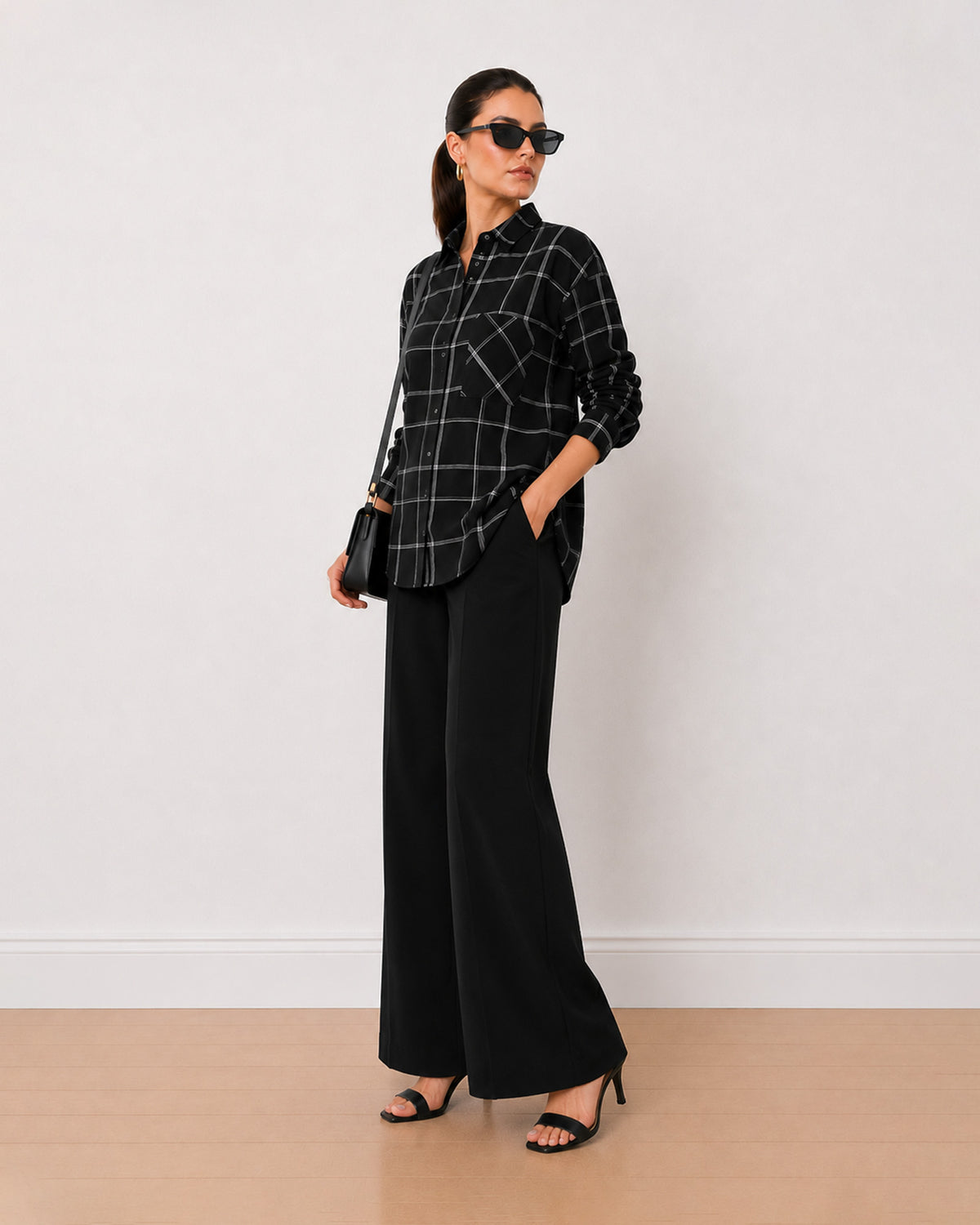 Alivia black checks cotton oversized shirt, angled view with the relaxed silhouette