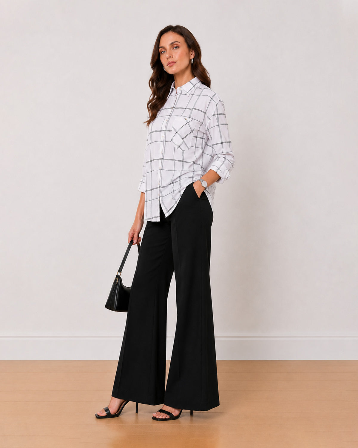 Alivia white checks cotton oversized shirt, angled view with the relaxed silhouette