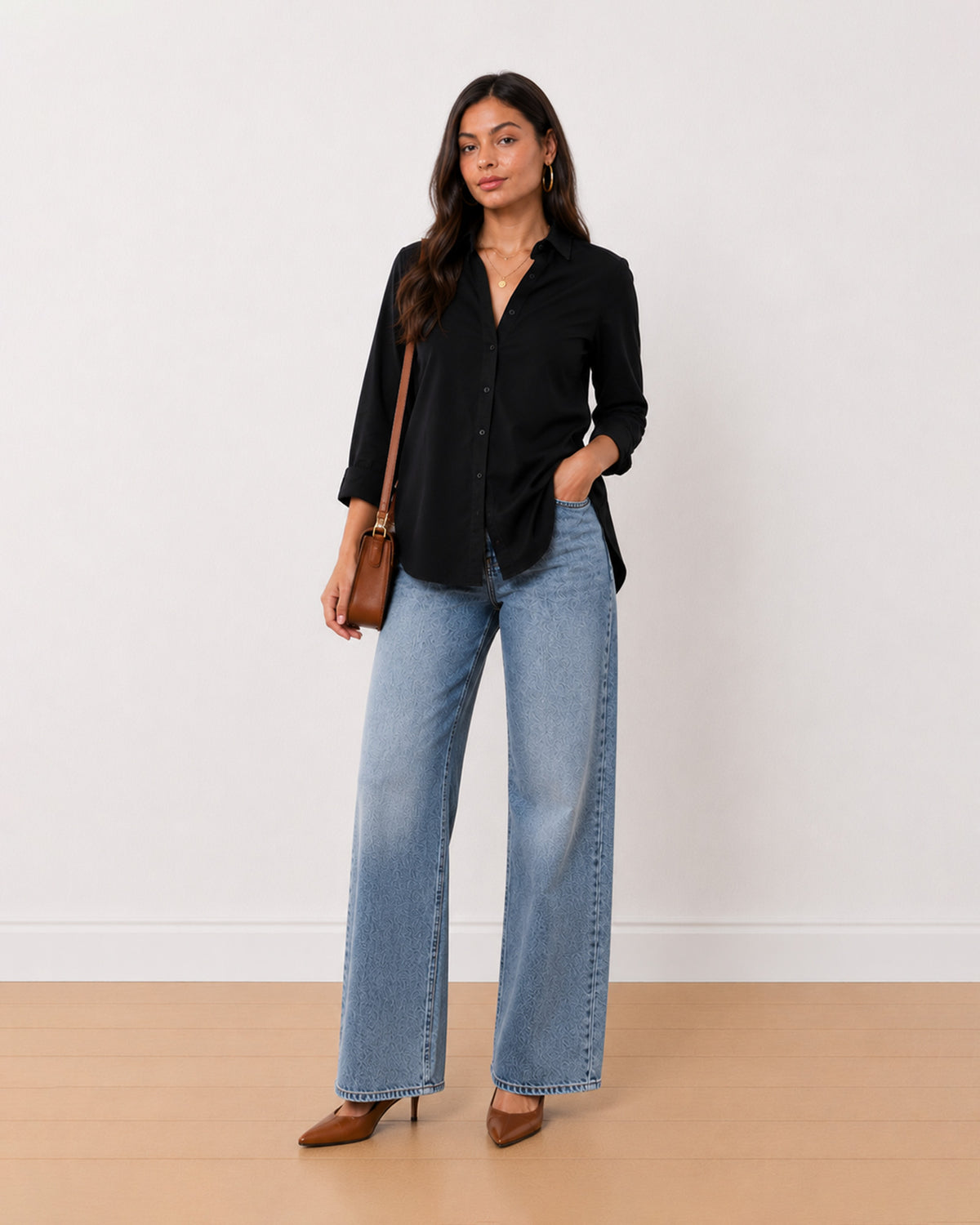 Allison black denim longline shirt, angled front view with the slim tall silhouette