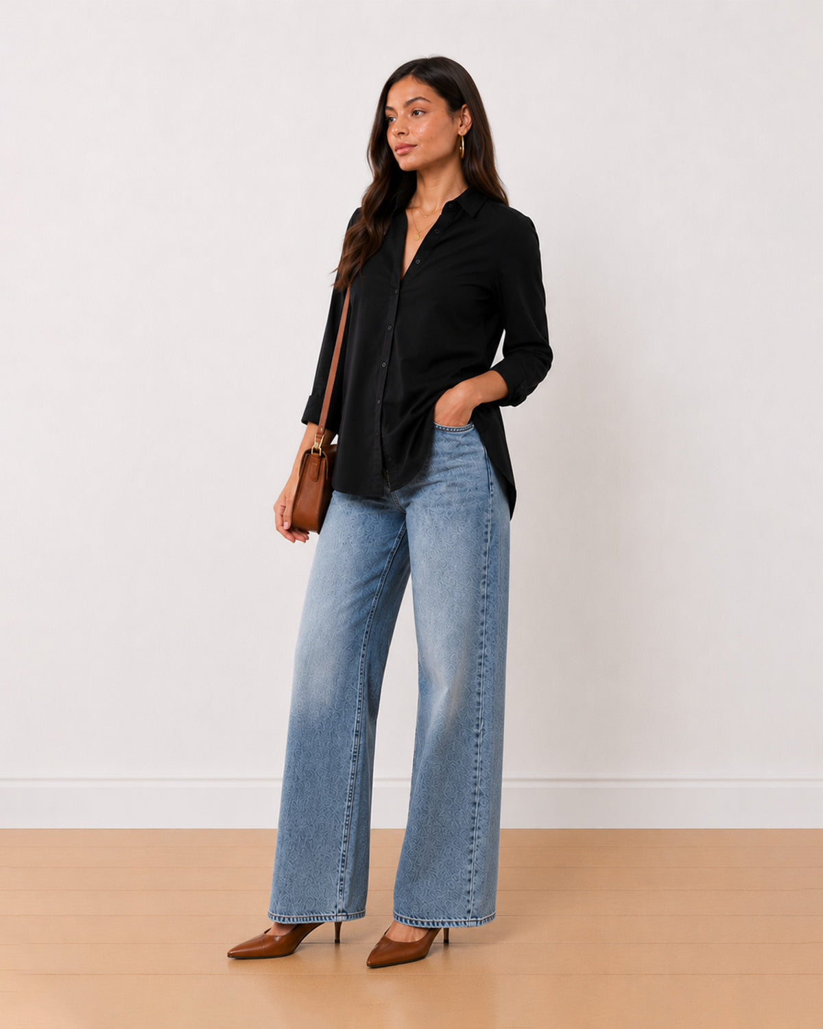 Allison black denim longline cotton shirt, angled view with the side slit