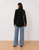 Allison black denim longline shirt back view with the elongating long length