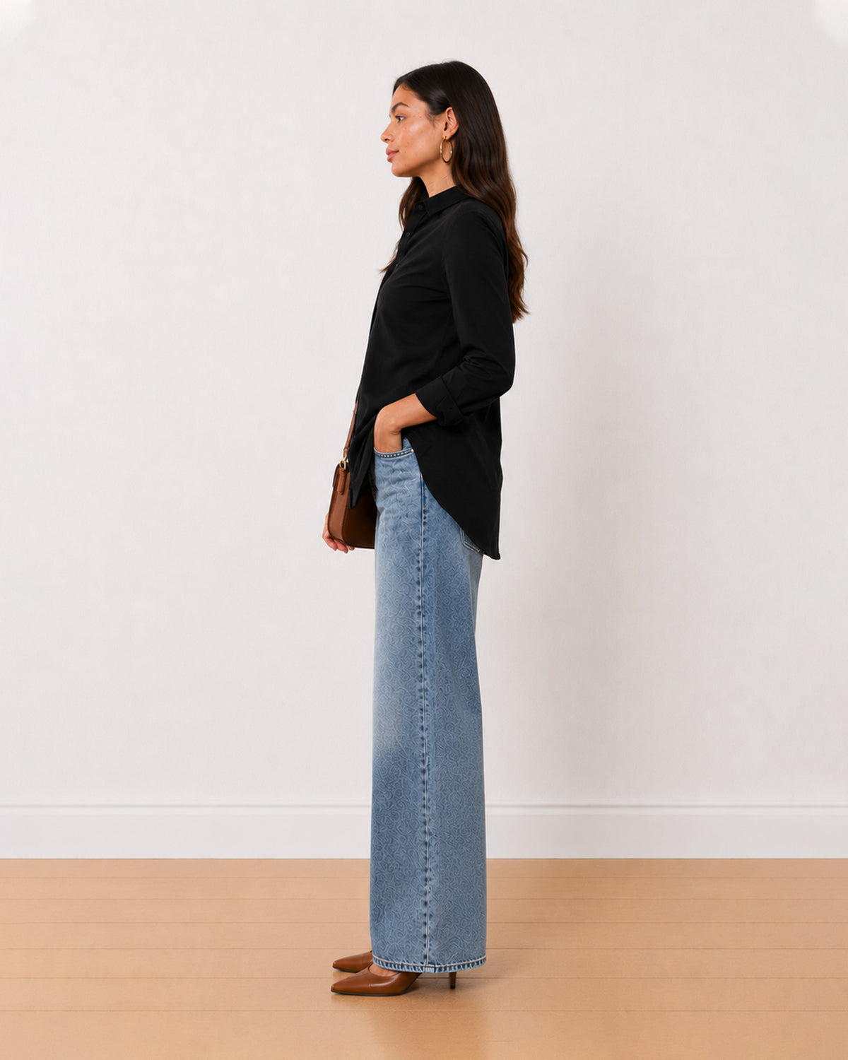 Allison black denim longline shirt side profile with the inseam side pockets