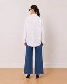 Alma pristine white 100% cotton oversized shirt back view with the long length