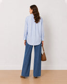 Alma sky blue 100% cotton oversized shirt back view with the long length