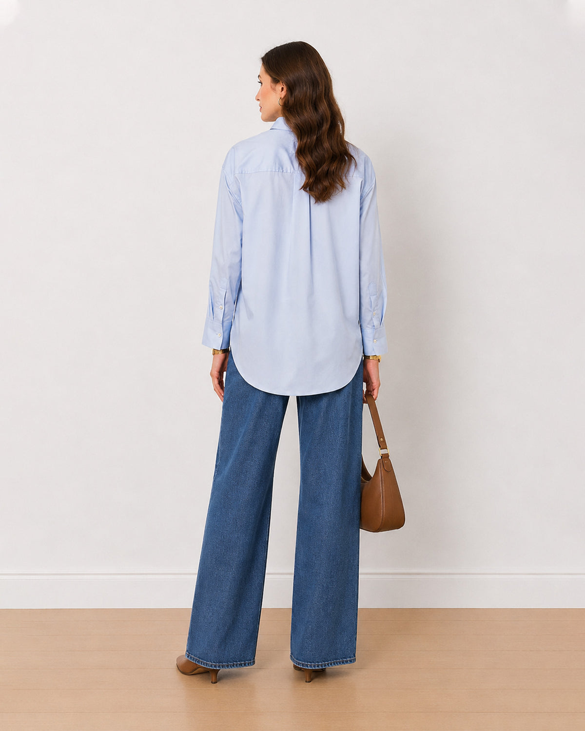 Alma sky blue 100% cotton oversized shirt back view with the long length