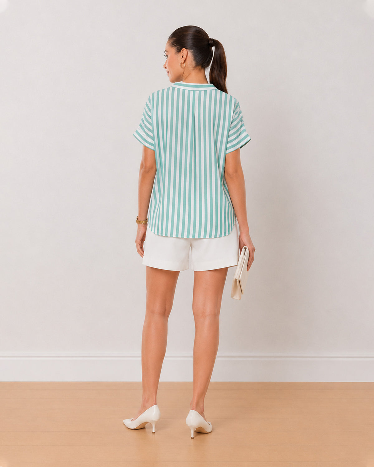 Alva green and white striped 100% viscose top back view with the boxy fit