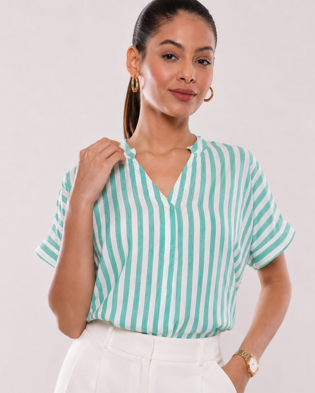 Alva green striped viscose top waist up front with the extended shoulders