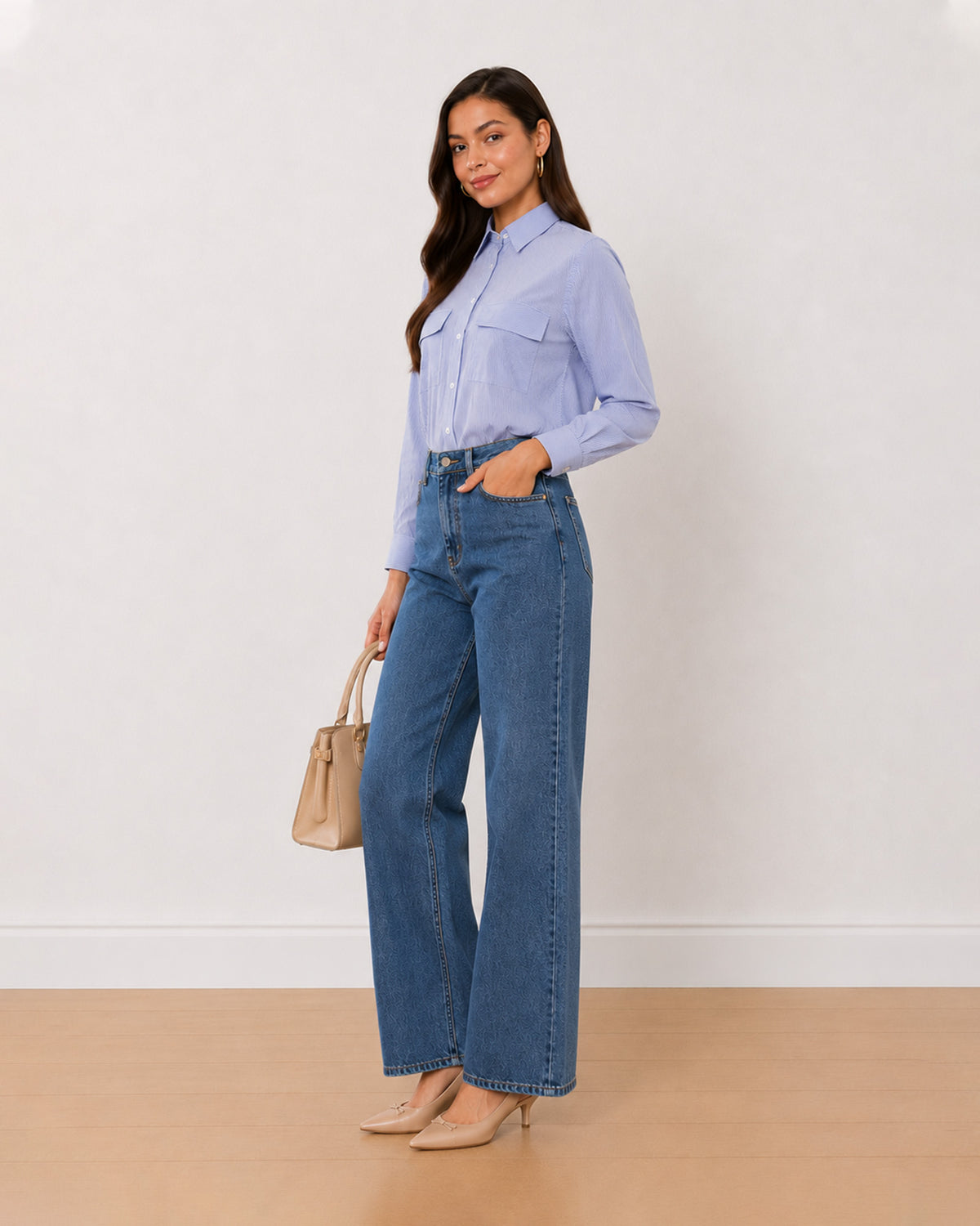 Alvina blue striped cotton utility shirt, angled view with the 2 utility pockets