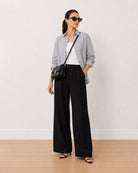 Amayra striped 100% cotton oversized shirt worn open as a smart layer, front view