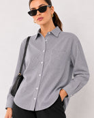 Amayra striped cotton oversized shirt waist up front with the curved hem