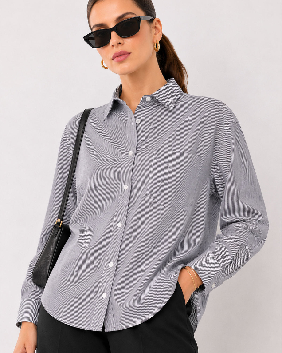 Amayra striped cotton oversized shirt waist up front with the curved hem
