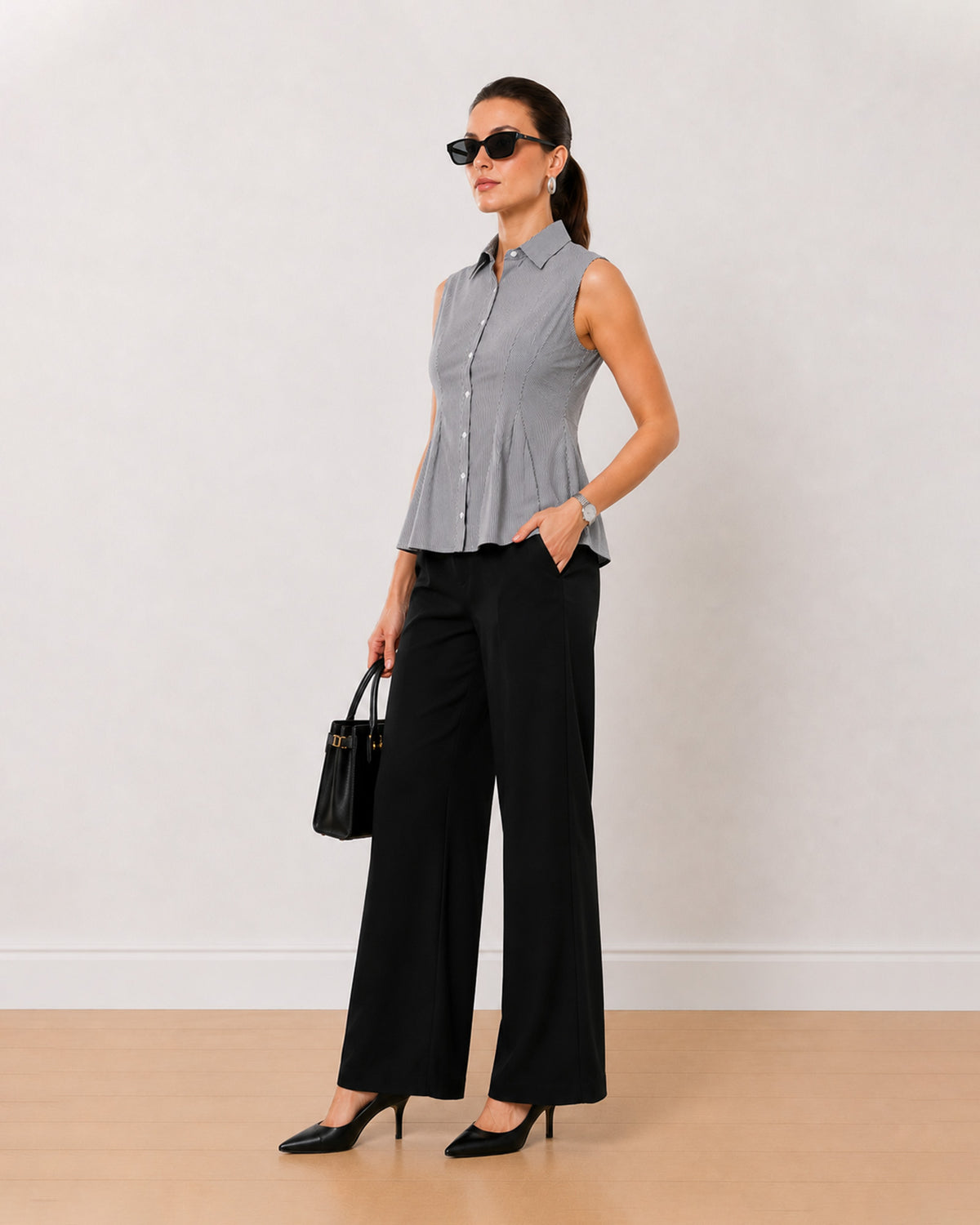 Amora black and white striped 100% cotton twill sleeveless shirt, angled front view