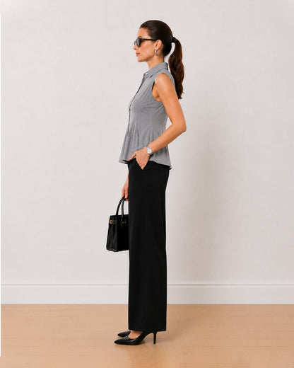 Amora black and white striped sleeveless shirt side profile with the flared hem