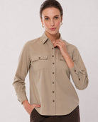 Analia fawn beige corduroy shirt waist up front with the 2 flap utility pockets