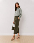 Angel sage green 100% viscose formal shirt, angled front view with the drop shoulder