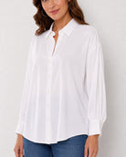 Angel white viscose shirt waist up front with the drop shoulder and curved hem