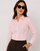 Anna baby pink cotton poplin shirt waist up front with the snug tailored fit