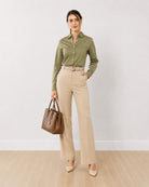 Anna khakhi beige stretch cotton poplin shirt, angled front view with the darts