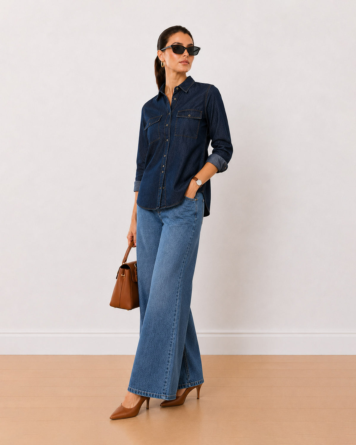Arena indigo denim utility shirt, angled view with the 2 utility pockets