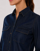Arena indigo denim shirt placket, utility pocket and hidden dignity buttons