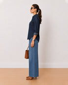 Arena indigo blue denim utility shirt side profile with the curved hem