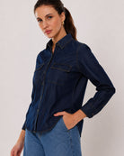 Arena indigo denim shirt waist up front with the 2 flap utility pockets